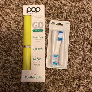 Pop sonic toothbrush with replacement heads